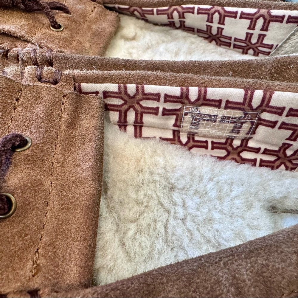 UGG Tan Suede Tassele Moccasin Slipper with White Fleece Lining - Picture 4 of 8